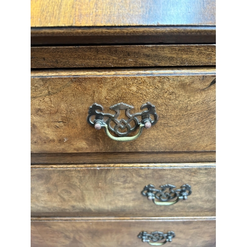 72 - A Georgian style burr walnut bureau