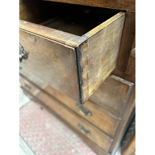 72 - A Georgian style burr walnut bureau