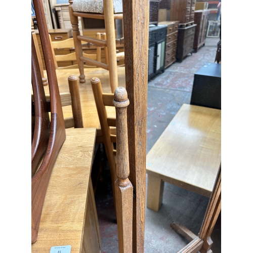 78 - An early 20th century oak cheval mirror - approx. 150cm high