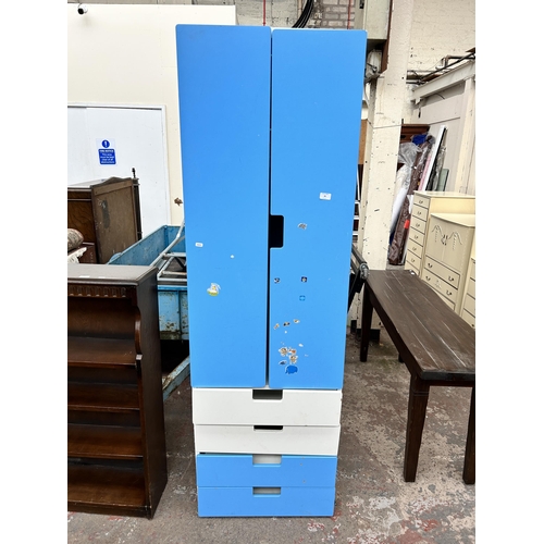 89 - A modern blue and white painted child's double wardrobe