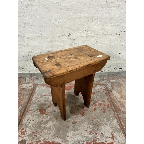 9 - A late 19th/early 20th century pine farmhouse stool - approx. 45cm high x 44cm wide x 25cm deep