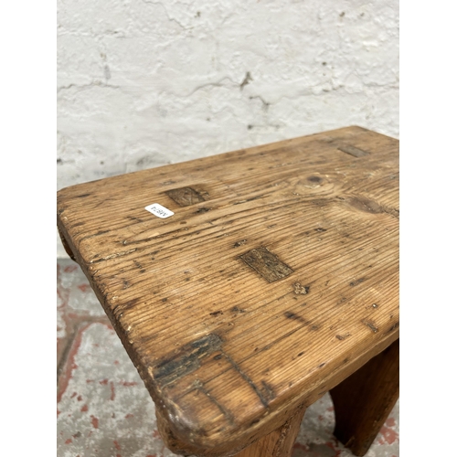 9 - A late 19th/early 20th century pine farmhouse stool - approx. 45cm high x 44cm wide x 25cm deep