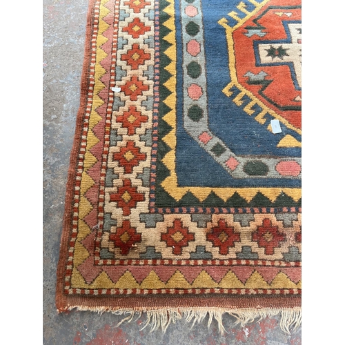 100 - An Eastern Kayam OCM 100% wool pile rug hand knotted in Turkey - approx. 193cm x 129cm