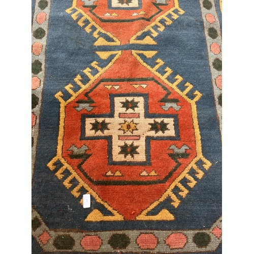 100 - An Eastern Kayam OCM 100% wool pile rug hand knotted in Turkey - approx. 193cm x 129cm