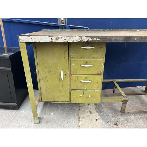 103D - A mid 20th century green painted steel work bench with fitted Record No. 74 vice - approx. 96cm high... 