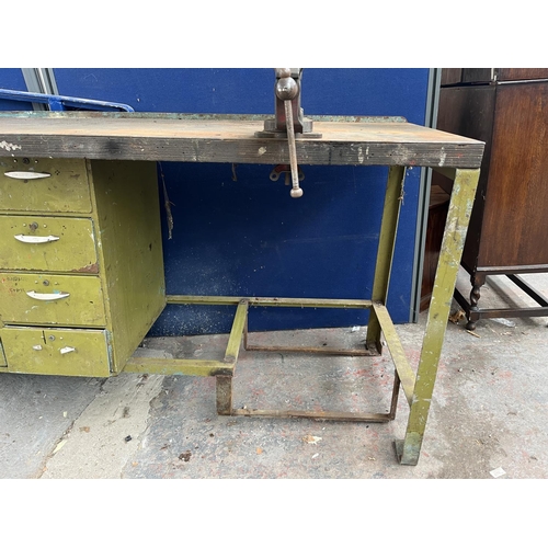 103D - A mid 20th century green painted steel work bench with fitted Record No. 74 vice - approx. 96cm high... 