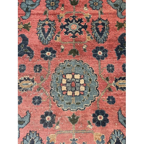 27 - A hand knotted rug - approx. 154cm x 100cm