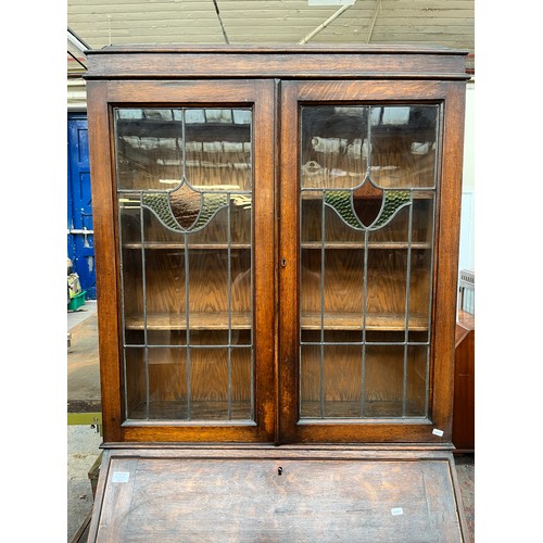 103A - An early 20th century oak bureau bookcase on barley twist supports - approx. 98cm high x 87cm wide x... 