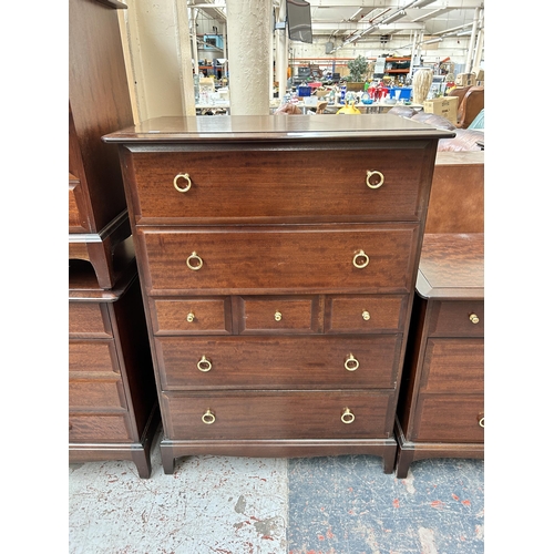 209 - A Turnidge of London Ltd teak three tier bookcase