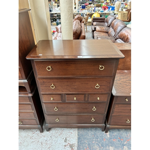 209 - A Turnidge of London Ltd teak three tier bookcase