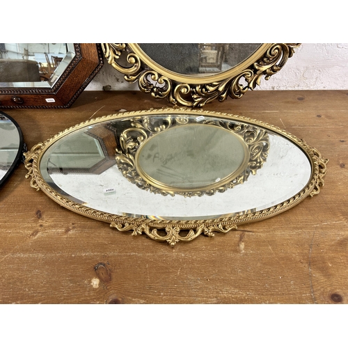 247 - Two early 20th century framed bevelled edge wall mirrors