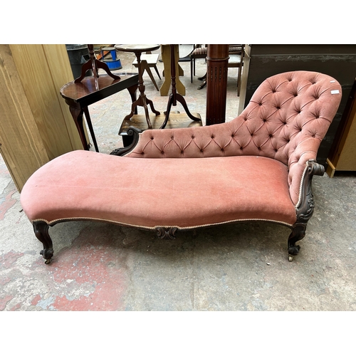 1 - A Victorian rosewood and pink fabric upholstered chaise longue