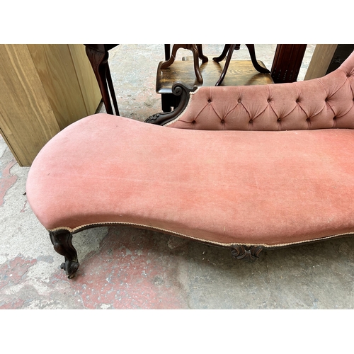 1 - A Victorian rosewood and pink fabric upholstered chaise longue