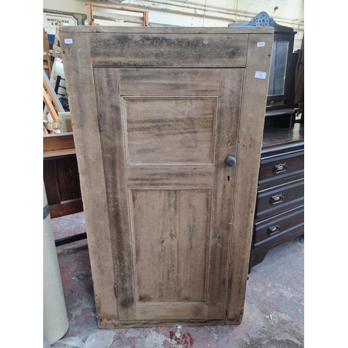 106 - A Victorian pine school cupboard - approx. 132cm high x 71cm wide x 35cm deep