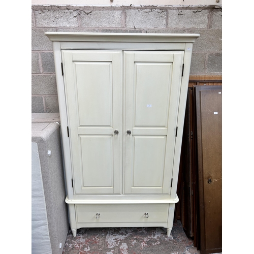 18 - A modern white painted double wardrobe possibly by Laura Ashley - approx. 193cm high x 112 wide x 59... 