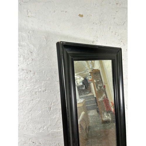 37 - A Dunelm black painted cheval mirror