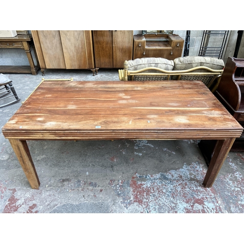 46 - An Indian sheesham wood rectangular dining table - approx. 76cm high x 92cm wide x 180cm long