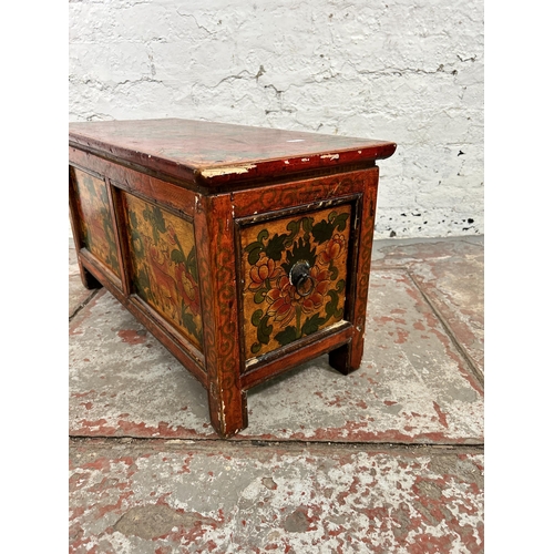 49 - A Tibetan style hand painted wooden dowry chest - approx. 35cm high x 65cm wide x 29cm deep