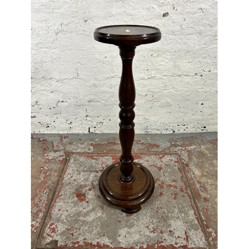 50 - A mahogany jardinière stand - approx. 78cm high