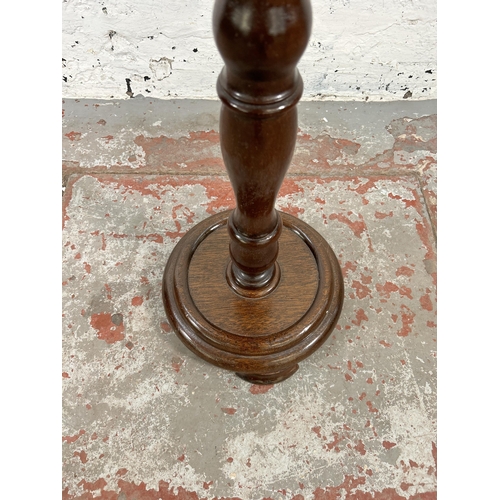 50 - A mahogany jardinière stand - approx. 78cm high