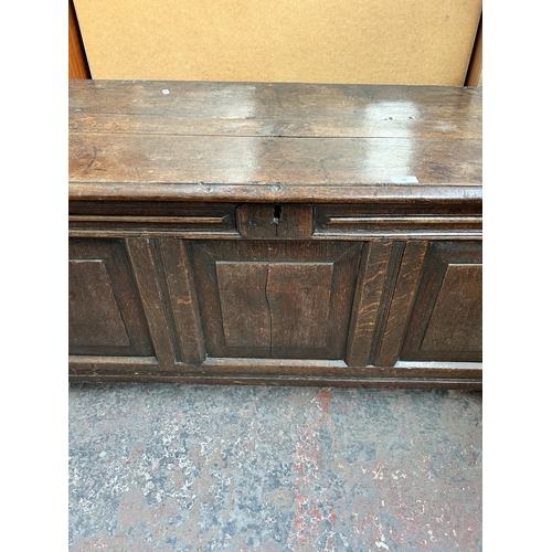 188 - A Georgian oak three panel coffer - approx. 63cm high x 136cm wide x 52cm deep