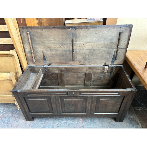 188 - A Georgian oak three panel coffer - approx. 63cm high x 136cm wide x 52cm deep