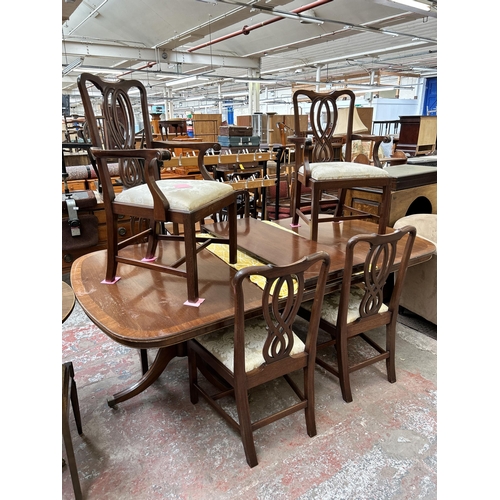 60 - A Bevan Funnell Reprodux mahogany extending dining table and six chairs