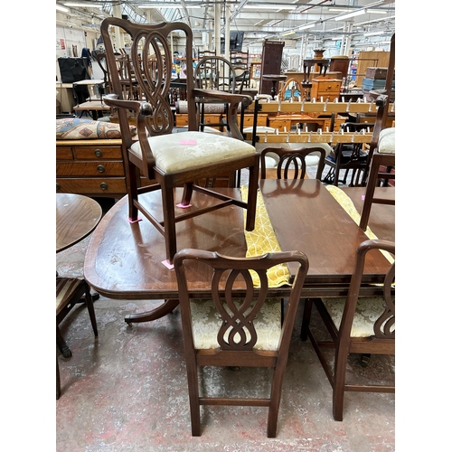 60 - A Bevan Funnell Reprodux mahogany extending dining table and six chairs