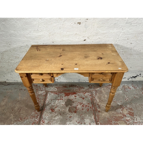 192 - A Victorian style pine writing desk - approx. 76cm high x 106cm wide x 56cm deep