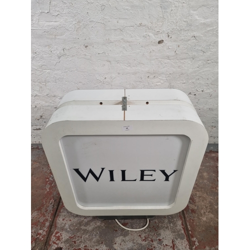 68 - A Wiley illuminating double sided advertising sign - approx. 70cm high x 60cm wide x 24cm deep