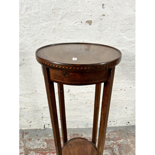 195 - An Edwardian inlaid mahogany circular two tier jardinière stand - approx. 92cm high x 30cm diameter