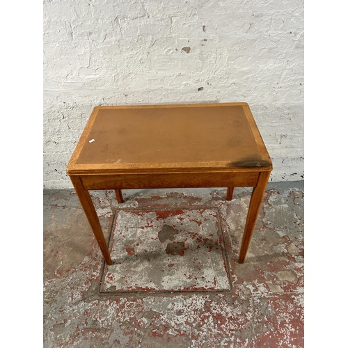 199 - A 1960s Remploy oak writing table - approx. 76cm high x 83cm wide x 52cm deep