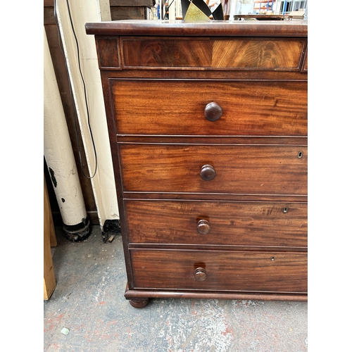 200 - An early 19th century mahogany chest of drawers with two secret drawers and turned supports - approx... 