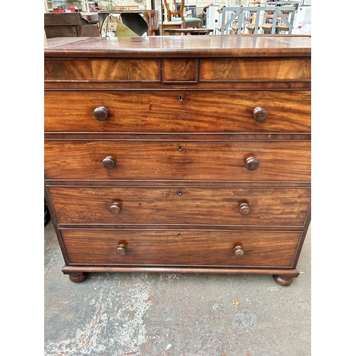 200 - An early 19th century mahogany chest of drawers with two secret drawers and turned supports - approx... 