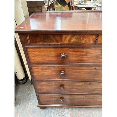 200 - An early 19th century mahogany chest of drawers with two secret drawers and turned supports - approx... 