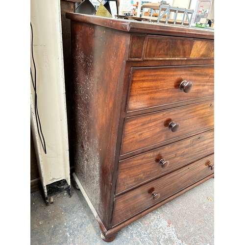 200 - An early 19th century mahogany chest of drawers with two secret drawers and turned supports - approx... 