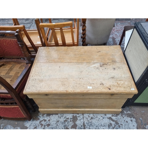 81 - A Victorian waxed pine blanket box - approx. 60cm high x 101cm wide x 65cm deep