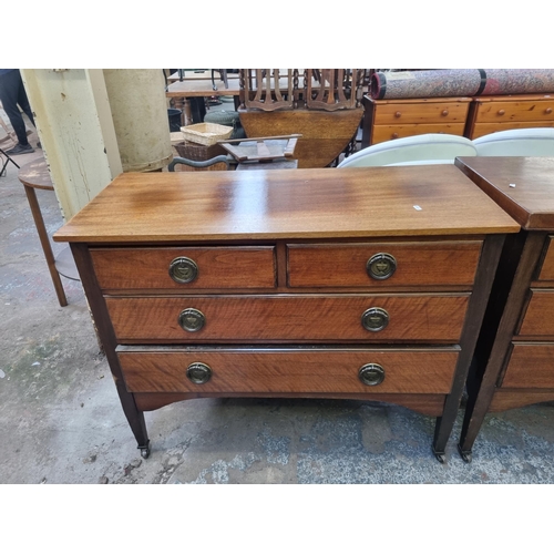 88 - A pair of Edwardian walnut chests of drawers