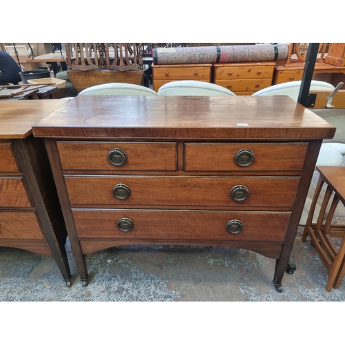 88 - A pair of Edwardian walnut chests of drawers