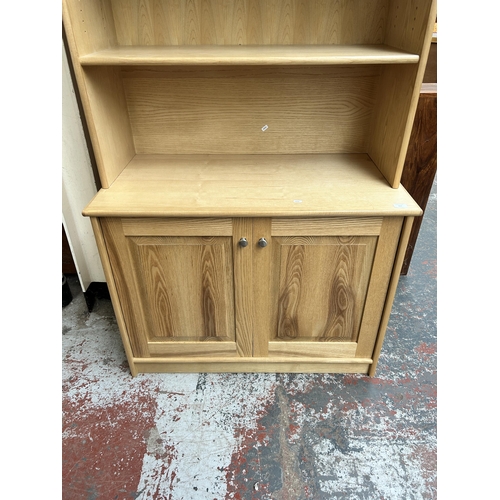 212 - A modern oak bookcase - approx. 205cm high x 98cm wide x 52cm deep