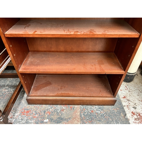 213 - A Georgian style mahogany three tier open bookcase - approx. 92cm high x 81cm wide x 29cm deep