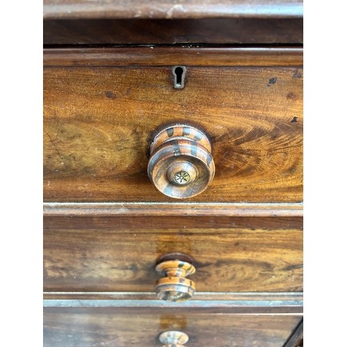 220 - A 19th century mahogany chest of drawers with carved acanthus leaf decoration - approx. 128cm high x... 