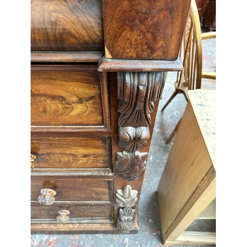 220 - A 19th century mahogany chest of drawers with carved acanthus leaf decoration - approx. 128cm high x... 