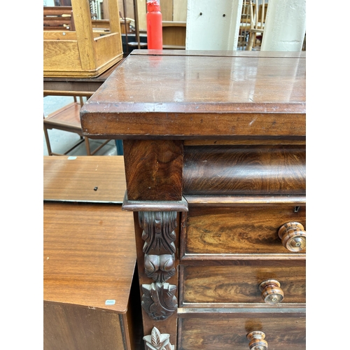 220 - A 19th century mahogany chest of drawers with carved acanthus leaf decoration - approx. 128cm high x... 