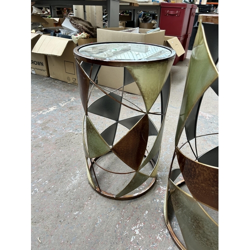 221 - Two contemporary metal and bevelled mirror glass cylindrical side tables - largest approx. 60cm high... 