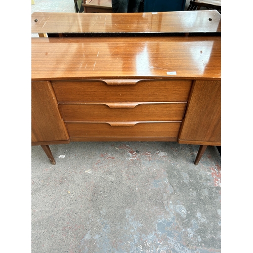 223 - A mid 20th century teak dressing table - approx. 116cm high x 131cm wide x 46cm deep