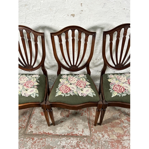 230 - Four Hepplewhite style mahogany shield back dining chairs