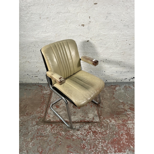 231 - A mid 20th century Martin Stoll style cream leather and chrome plated cantilever armchair