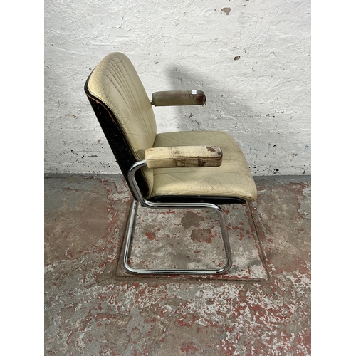 231 - A mid 20th century Martin Stoll style cream leather and chrome plated cantilever armchair