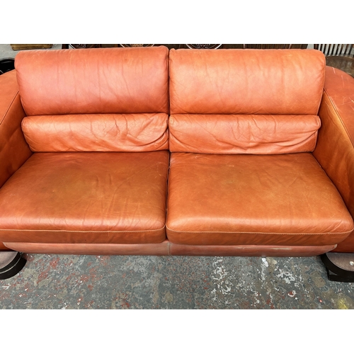 233 - An Italian Marinelli orange leather sofa - approx. 79cm high x 214cm wide x 98cm deep